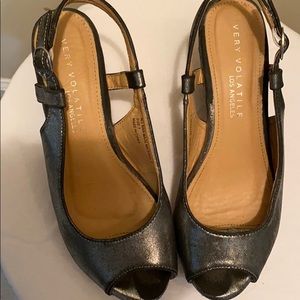 Volatile cork/metallic silver platform wedges